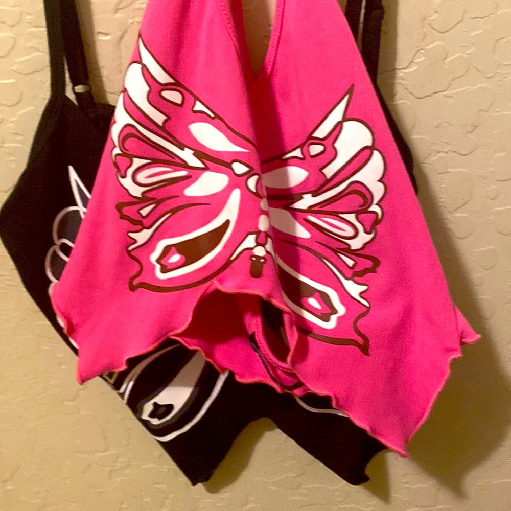 I am selling this cute black and white butterfly tops